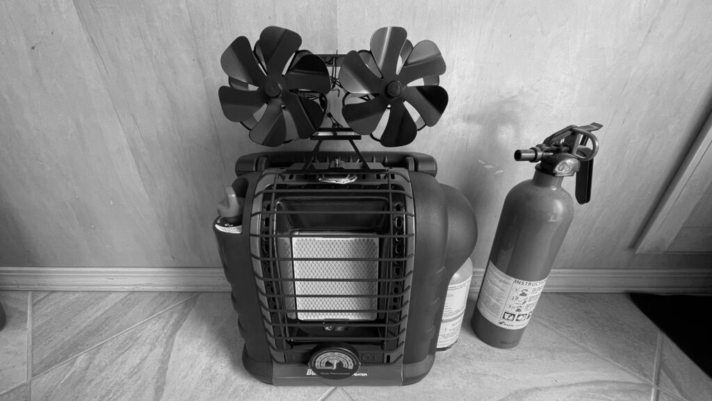 Hr. Heater portable Buddy Heater with fan, refillable tank, and fire extinguisher.