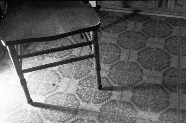 Light Casting a Shadow From Chair Legs