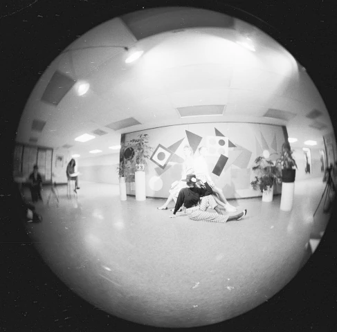 Glamour Image of two Women through a Fish-eye Lens