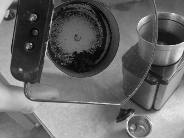 Remove Coffee From the Grinder Cover First